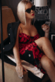 Glamour woman sitting in bedroom