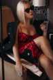 Glamour woman sitting in bedroom