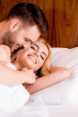 Man an woman in bed
